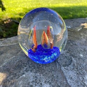 Hand blown glass paperweight with three sailboat sails Suspended in Ocean